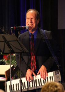 David Glickman performing on stage